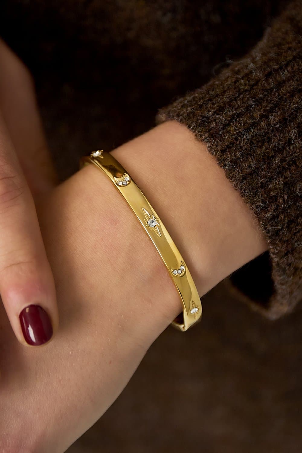Roestvrijstalen armband met maan en ster.